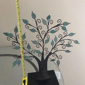 Metal tree with cut-out leaves
